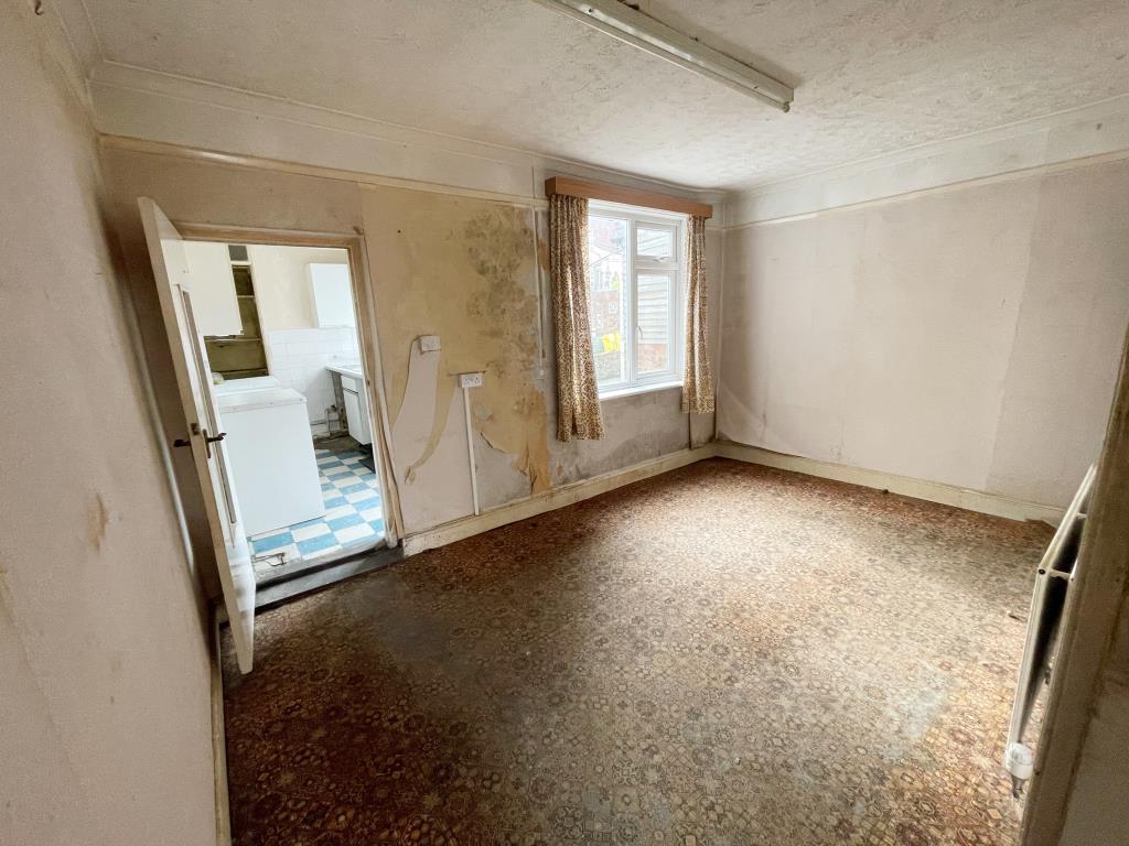 Lot: 1 - THREE-BEDROOM TERRACE HOUSE FOR REFURBISHMENT - Dining room leading to kitchen